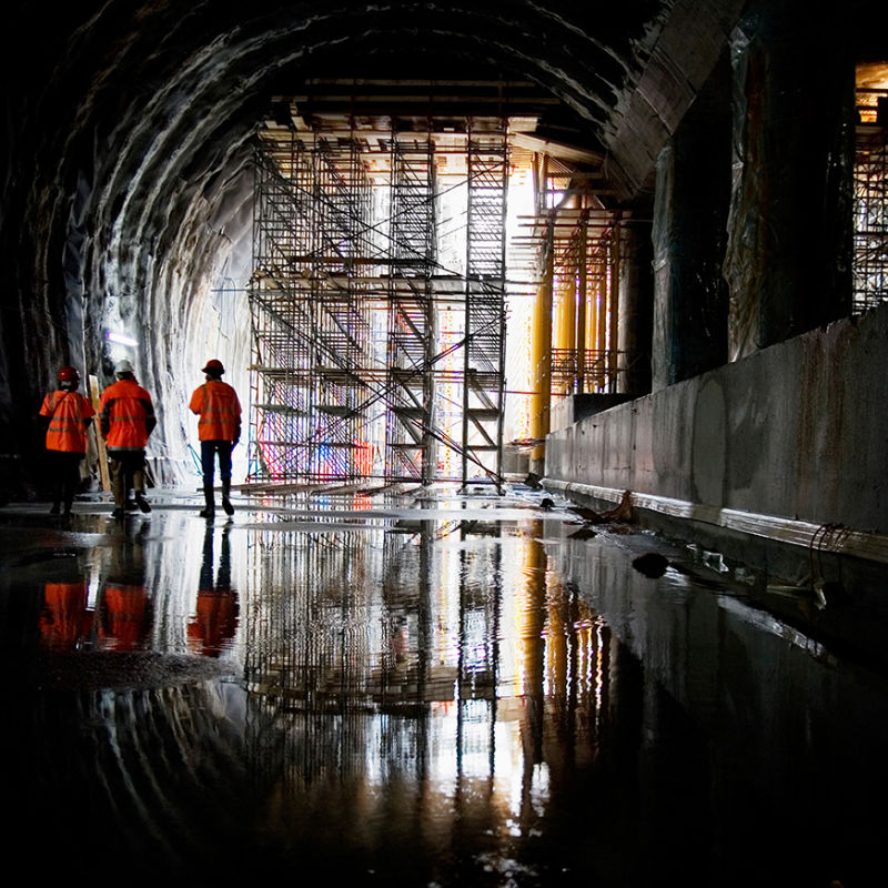 Rear view of workers at construction site